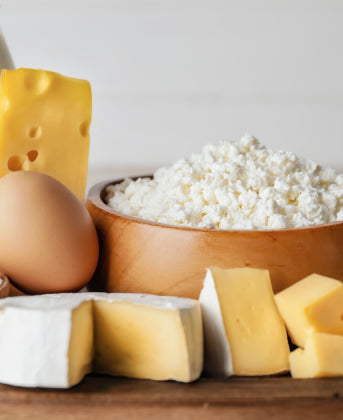 Variety of lactose-free foods, including almond milk, yogurt, and cheese